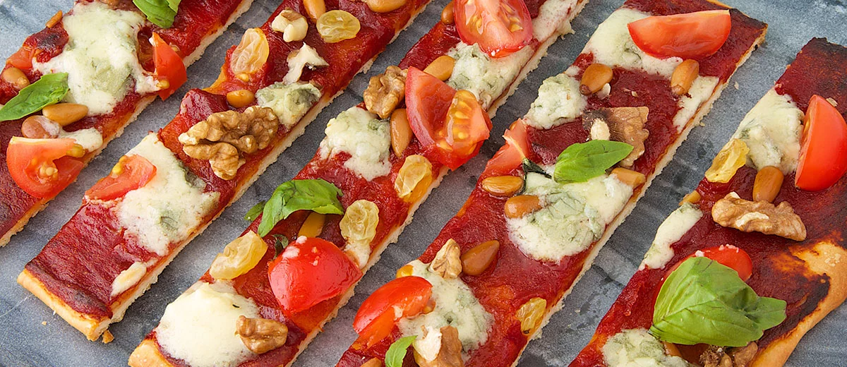 Pizza au Roquefort Société, tomates et fruits secs